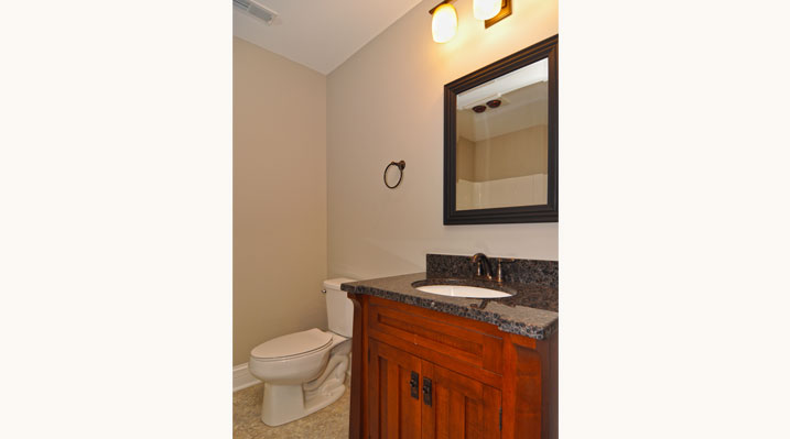 ICH Builders Mt. Sterling residence custom build another view of the milled wood custom-made vanity in the bathroom